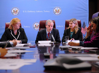 USAID Assistant Administrator Nancy Lindborg plays with Syrian children at press round table in Turkey. (January 25, 2013) 
