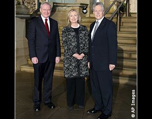 Secretary Clinton stands with First Minister Peter Robinson, right, and deputy First Minister Martin McGuinness of the Northern Ireland Government Assembly in Belfast December 7. (AP)