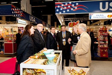 Lora Baker, Jim Melville and Steve Hubler (from left) with U.S. exhibitors at the ISM in Cologne 