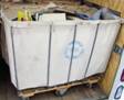 Picture of large, white hamper on wheels with NIH recycle logo on side and full of paper materials to be recycled.