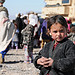 <p>A young Farahi girl waits patiently to receive assistance during a visit to her village, Feb. 9.  Provincial Reconstruction Team (PRT) Farah visited the returnee and refugee village on the outskirts of Farah City to conduct a site survey and deliver humanitarian assistance.  PRT Farah's mission is to train, advise, and assist Afghan government leaders at the municipal, district, and provincial levels in Farah province Afghanistan.  Their civil military team is comprised of members of the U.S. Navy, U.S. Army, the U.S. Department of State and the U.S. Agency for International Development (USAID).  (U.S. Navy photo by Lt. j.g. Matthew Stroup/released)</p>