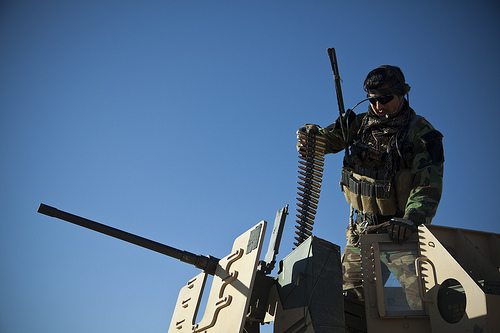 <p>An Afghan National Army special operations forces soldier prepares a .50-caliber machine gun before a unilateral mission in Herat province, Afghanistan, Feb. 8, 2013. Afghan National Security Forces took the lead in security operations to bring security and stability to the people of Afghanistan. (U.S. Marine Corps photo by Sgt. Pete Thibodeau/Released)</p>