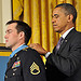 <p>President Barack H. Obama, right, awards the Medal of Honor to former U.S. Army Staff Sgt. Clinton L. Romesha during a ceremony at the White House in Washington, D.C., Feb. 11, 2013. Romesha received the award for actions during the Battle of Kamdesh at Combat Outpost Keating, Nuristan province, Afghanistan, Oct. 3, 2009. Romesha was a section leader with Bravo Troop, 3rd Squadron, 61st Cavalry Regiment, 4th Brigade Combat Team, 4th Infantry Division at the time of the battle. (U.S. Army photo by Leroy Council/Released)</p>