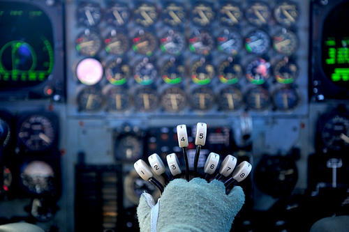 <p>U.S. Air Force Capt. Benjamin Visser, a pilot with the 2nd Bomb Wing at Barksdale Air Force Base, La., adjusts the power on the eight engines of his B-52 Stratofortress aircraft while flying a mission during exercise Cope North 2013 near Andersen Air Force Base, Guam, Feb. 7, 2013. Cope North is an annual air combat tactics, humanitarian assistance and disaster relief exercise designed to increase the readiness and interoperability of the U.S. Air Force, Japan Air Self-Defense Force and Royal Australian Air Force. (U.S. Air Force photo by Senior Airman Matthew Bruch/Released)</p>