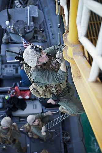 <p>U.S. Marine Corps Pfc. Darell Lippert, Maritime Raid Force, 15th Marine Expeditionary Unit, climbs a ladder during gas and oil platform seizure training during Exercise Leading Edge 13, Peleliu Amphibious Ready Group Feb. 6, 2013. The exercise is a multinational and interagency supported exercise designed to develop and refine weapons integration capabilities among partnering nations including suspect maritime material inspections, seizure and disposition.  The 15th MEU is deployed as part of the Peleliu Amphibious Ready Group as a U.S. Central Command theatre reserve force, providing support for maritime security operations and theatre security cooperation efforts in the U.S. 5th fleet are of responsibility. (U.S. Marine Corps photo by Cpl. Bobby J. Gonzalez/Released)</p>