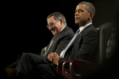 <p>Secretary of Defense Leon E. Panetta, left, and President Barack Obama listen to remarks by Chairman of the Joint Chiefs of Staff Army Gen. Martin E. Dempsey, not shown, during the Armed Forces Farewell Tribute to Panetta Feb. 8, 2013, at Joint Base Myer-Henderson Hall, Va. Panetta was scheduled to retire after serving as the 23rd secretary of defense. (DoD photo by Erin A. Kirk-Cuomo/Released)</p>