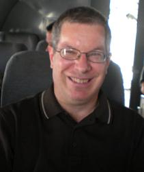 Picture of Ken on a plane flying from Kabul, Afghanistan to Bagram AFB, Afghanistan in April 2009