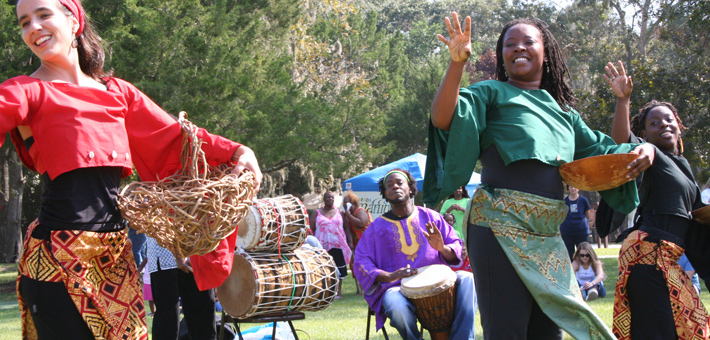 Photo of three women performing African dance (NPS/Tracy Pellicer)