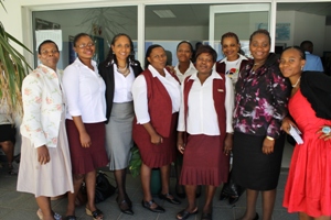 Ambassador James and Member of Parliament Nonhlanhla Dlamini poses with Mentor Mothers and Staff from the m2m office (Photo Credit: State Department). 