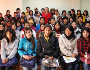 Sara Greengrass (center, in red) with Bolivian students (State Department)