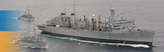 USNS Rainier refuels mine countermeasure ships USS Scout and USS Devastator