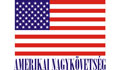 Official logo of the U.S. Embassy Budapest: the U.S. Flag with text in Hungarian