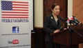 Ambassador Kounalakis delivers her remarks at the conference with the Embassy logo in the background. (Embassy photo by Attila Németh) 