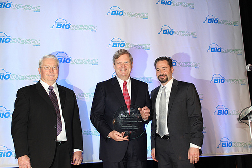 Secretary Vilsack receives the National Energy Leadership Award from the National Biodiesel Board.  The award is given periodically to individuals who demonstrate exemplary vision and leadership in development of the renewable fuels industry.  Pictured left to right are Ed Ulch, Governing Board Member, National Biodiesel Board; Secretary Tom Vilsack; and Joe Jobe, CEO, National Biodiesel Board.