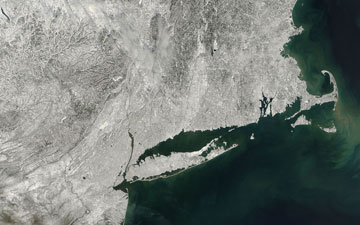 At 10:50 a.m. EST on Feb. 10, 2013, the day after the New England snowstorm, the MODIS instrument aboard NASA's Aqua satellite captured this visible image of the snow cover over the New England states, New York, New Jersey and Pennsylvania.