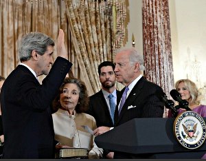 Vice President Joe Biden swears in Secretary of State John Kerry, surrounded by his family, at the U.S. Department of State in Washington, D.C., February 6, 2013 (State Dept. photo)