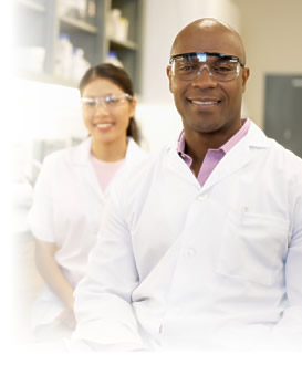 photo of two smiling scientists