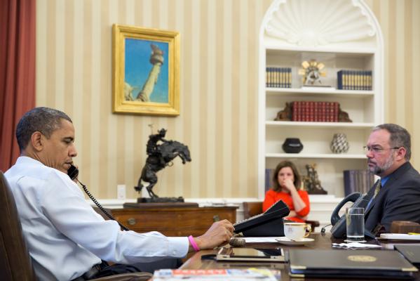 President Barack Obama receives an update on the ongoing response to Hurricane Sandy during a conference call with FEMA Administrator Craig Fugate, Dr. Rick Knabb, Director of the National Hurricane Center, and John Brennan, Assistant to the President for Homeland Security and Counterterrorism, in the Oval Office, Oct. 26, 2012. Alyssa Mastromonaco, Deputy Chief of Staff for Operations, and Richard Reed, Deputy Assistant to the President for Homeland Security, are seated at right. (Official White House Photo by Pete Souza)