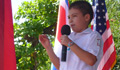 Jordan Ostía presentó un mensaje durante la ceremonia de clausura del Lazo Rojo.(U.S. State Department)