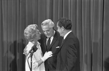 Mrs. Burger, Warren E. Burger (the President's nominee for Chief Justice of the U.S. Supreme Court) and President Nixon at the announcement of Burger's nomination.