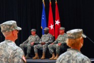Maj. Gen. Emmett R. Titshaw (left), the Adjutant General of Florida, Col. Michael Calhoun (middle) and Col. Perry Hagaman observe the formation of Troops during the change of command ceremony for the Florida National Guard's 83rd Troop Command, July 9, 2011. Calhoun assumed command from Hagaman, who currently serves as the Chief of Staff for the Florida National Guard. Photo by 2nd Lt. Gavin Rollins