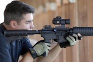 Staff Sgt. Justin Carr of the 290th JCSS checks the sites on an M-4 rifle during training for his unit at MacDill Air Force Base, Fla., May 16, 2009. Photo by Tech. Sgt. Thomas Kielbasa