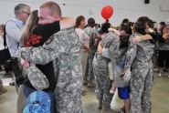 Soldiers from the Florida Army National Guard's 1153rd Financial Management Detachment greet family members after returning home from a year-long deployment to Iraq, during a ceremony at the Mark Lance Armory in St. Augustine, Nov. 3, 2011. Photo by Master Sgt. Thomas Kielbasa