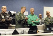 Florida Gov. Rick Scott (third from left) and Adjutant General of Florida Maj. Gen. Emmett Titshaw Jr. (left) receieve a briefing from the 601st AOC during a visit to Tyndall Air Force Base, Jan. 5, 2012. Courtesy photo