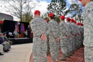Members of the 202nd RED HORSE Squadron listen to an address by Florida Gov. Rick Scott during the unit's deployment ceremony at Camp Blanding Joint Training Center, March 2, 2012. Photo by Debra Cox