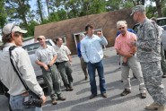 Land Component Commander Brig. Gen. Richard Gallant (right) meets with members of the Florida Wildlife Corridor Expedition and the Florida Fish and Wildlife Conservation Commission (FWC) at Camp Blanding Joint Training Center, April 9, 2012. The thousand-mile, 100-day expedition stopped at the National Guardâs training post in North Florida to emphasize the importance of the military site as a wildlife habitat. Photo by Master Sgt. Thomas Kielbasa