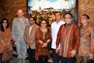 Adjutant General of Florida Maj. Gen. Emmett Titshaw Jr. meets with a delegation from Indonesia, June 19, at the historic Florida National Guard headquarters in St. Augustine, Fla., to receive a packet of soil collected on Morotai Island where Florida Guardsmen fought during World War II. The soil was presented in front of the  Florida National Guard Heritage Art Collection painting entitled "Assault at Red Beach: Morotai Island." Photo by Debra Cox