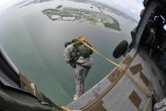 A member of the Florida Army National Guard's Charlie Company, 3rd Battalion, 20th Special Forces Group, exits a UH-60 Black Hawk helicopter during an airborne training exercise in Key West, Fla., Sept. 27, 2012. Photo by Master Sgt. Thomas Kielbasa