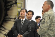 Senior Master Sgt. Ted Karst of the 125th Fighter Wing (right) shows off an F-15 Eagle engine to representatives from the Japanese Air Defense Force and Mitsubishi Heavy Industries, during a tour of the 125th's maintenance facilities, Nov. 16, 2012. Photo by Master Sgt. Thomas Kielbasa