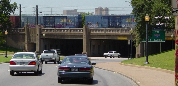 Train on urban overpass