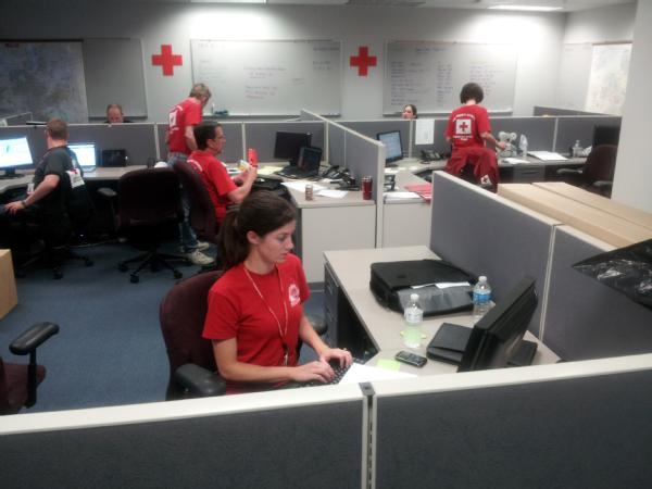 April 15, 2012 -- American Red Cross Workers prepare for a meeting to discuss operations.