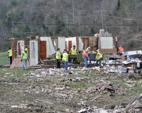 Denver, Ky., March 13, 2012 -- Volunteers from the Christian Appalachian Project, Inc. help gut a destroyed home. Voluntary agencies team together with FEMA to assist in early response and recovery.