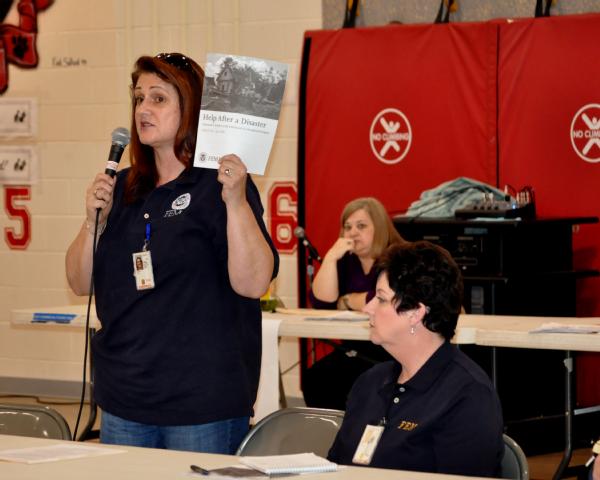 Butler, Ky., March 20, 2012 -- Lisa Demers, representing FEMA Individual Assistance, addresses the attendees at the Pendleton County community meeting. FEMA participates in local events sharing information and answering questions for those affected by the tornado.