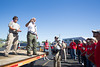 Bruce Bailey, Executive Director of the AmeriCorps St. Louis Emergency Response Team gives direction to the Kansas City Chiefs volunteers before heading out into the field in Joplin. (Photo by Scott Julian, 2011)