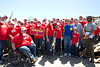 Kansas City Chief Players, employees, and family members, pose with AmeriCorps members after a long day of volunteering in Joplin, MO. (Photo by Scott Julian, 2011)