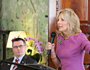 Help for Heroes Major Pete Norton GC looks on as Dr. Jill Biden delivers remarks at Winfield House (Embassy photo)