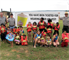 DENISON, Texas — Tommy Holder (left), and Josh Wingfield, both park rangers with the U.S. Army Corps of Engineers Tulsa District, along with Student Conservation Association intern Matt Mueller pose with a group of children who have learned about water safety at Lake Texoma. The Tulsa District has teamed with Wendy