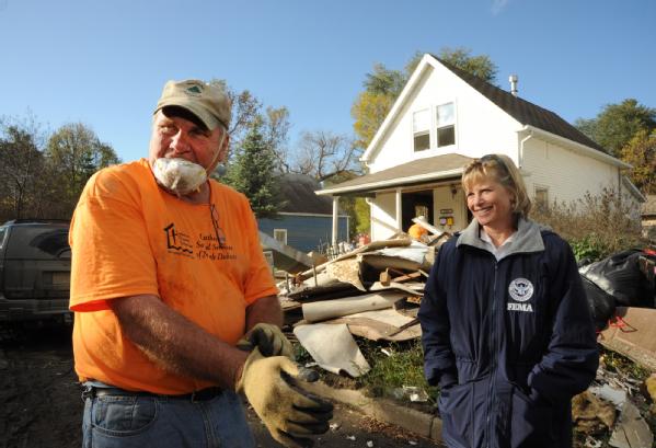 FEMA Region VIII Administrator Robin Finegan visits with Dale, a Wisconsin-based volunteer.