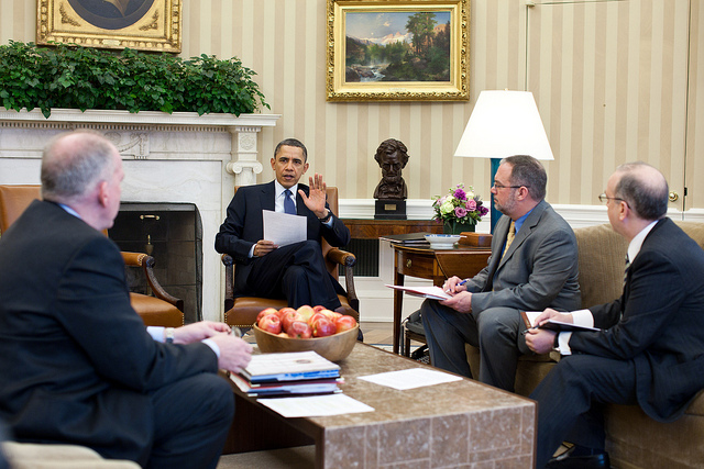 President Barack Obama receives a briefing on the earthquake in Japan and the tsunami warnings across the Pacific in the Oval Office, March 11, 2011.