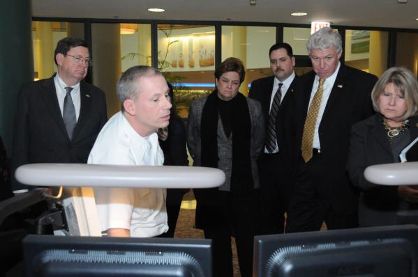 FEMA officials tour the Chicago Office of Emergency Communications.