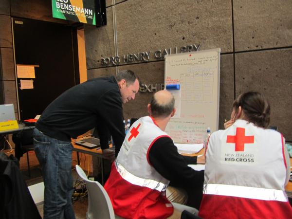 Tim Manning, left, Deputy Administrator for Protection and National Preparedness at the Federal Emergency Management Agency, working with the Red Cross in Christchurch.