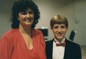 Image of Ryan White with his mother and they are dressed up.