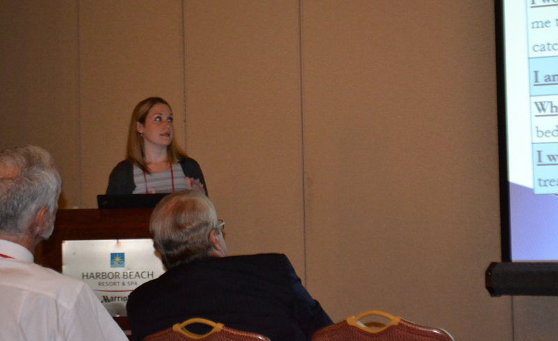 Dr. Laura Neeley presents her work on suicide prevention in the military to attendees of the 2012 Military Health System Research Symposium in Fort Lauderdale, Fla. Aug. 15