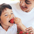 Mom and Son eating strawberries