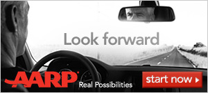 Look forward-AARP Real Possibilites-photo of man looking down road with reflection in rear view mirror