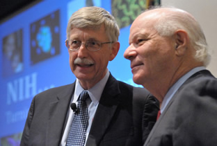 NIH director Dr. Francis Collins (l) welcomes U.S. Sen. Ben Cardin (D-MD) at a town meeting.